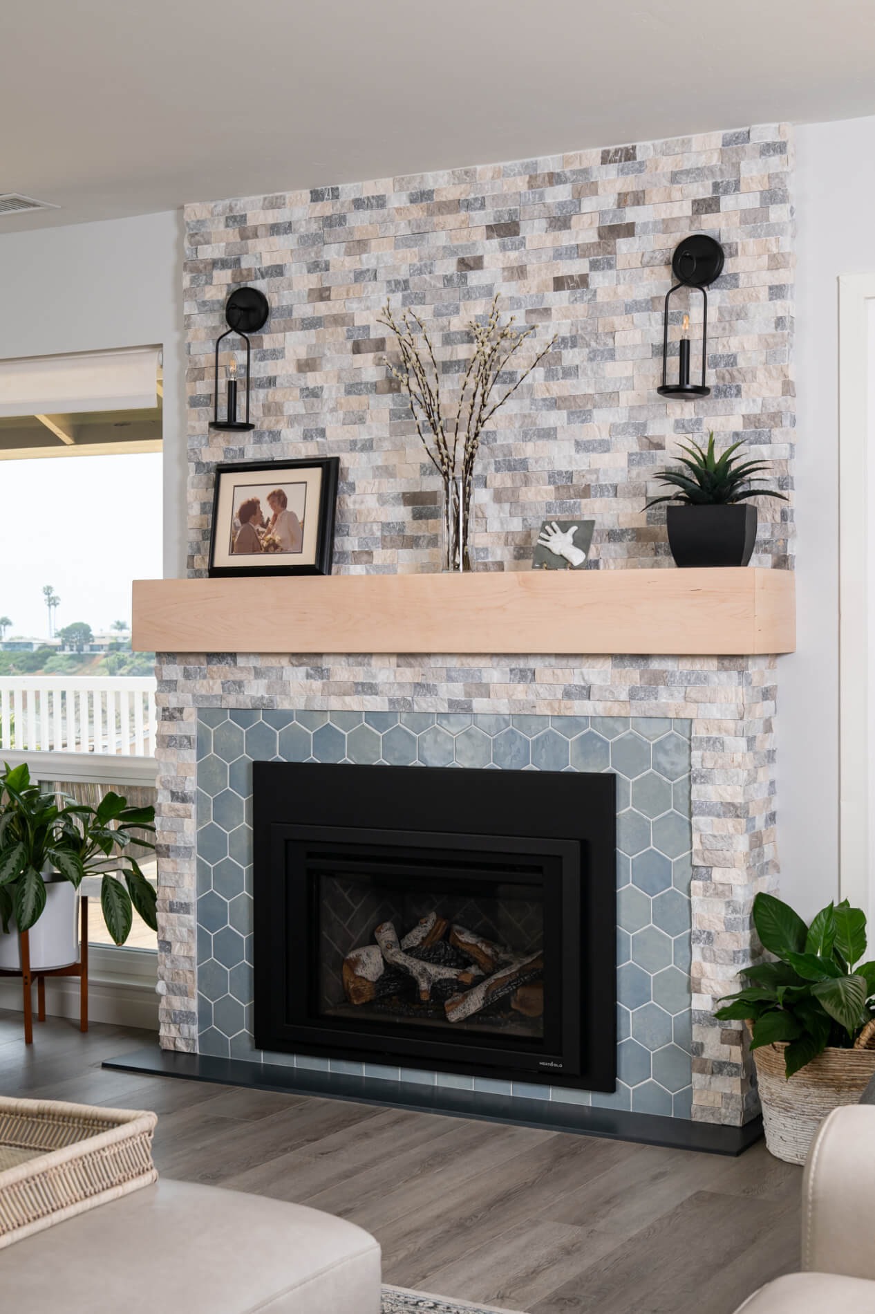 Single section of open shelving above a corner desk with hydrangea vase in Duluth GA