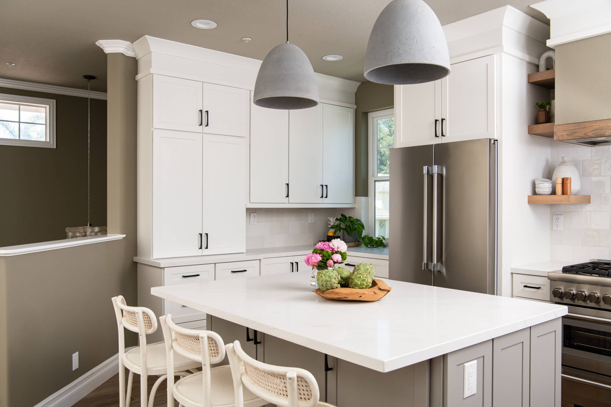 Modern farmhouse kitchen alt angle with peonies styling