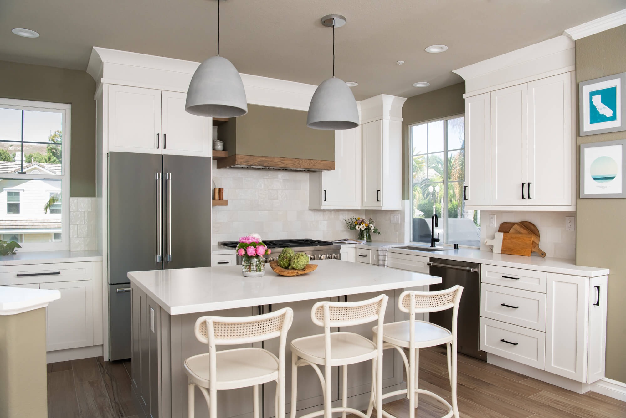 Modern farmhouse kitchen alt wide view with California prints