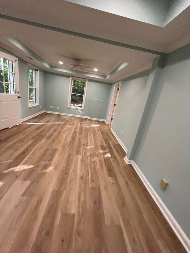 Fresh interior paint and light wood flooring by Interior Transformation Remodeling in Metro Atlanta