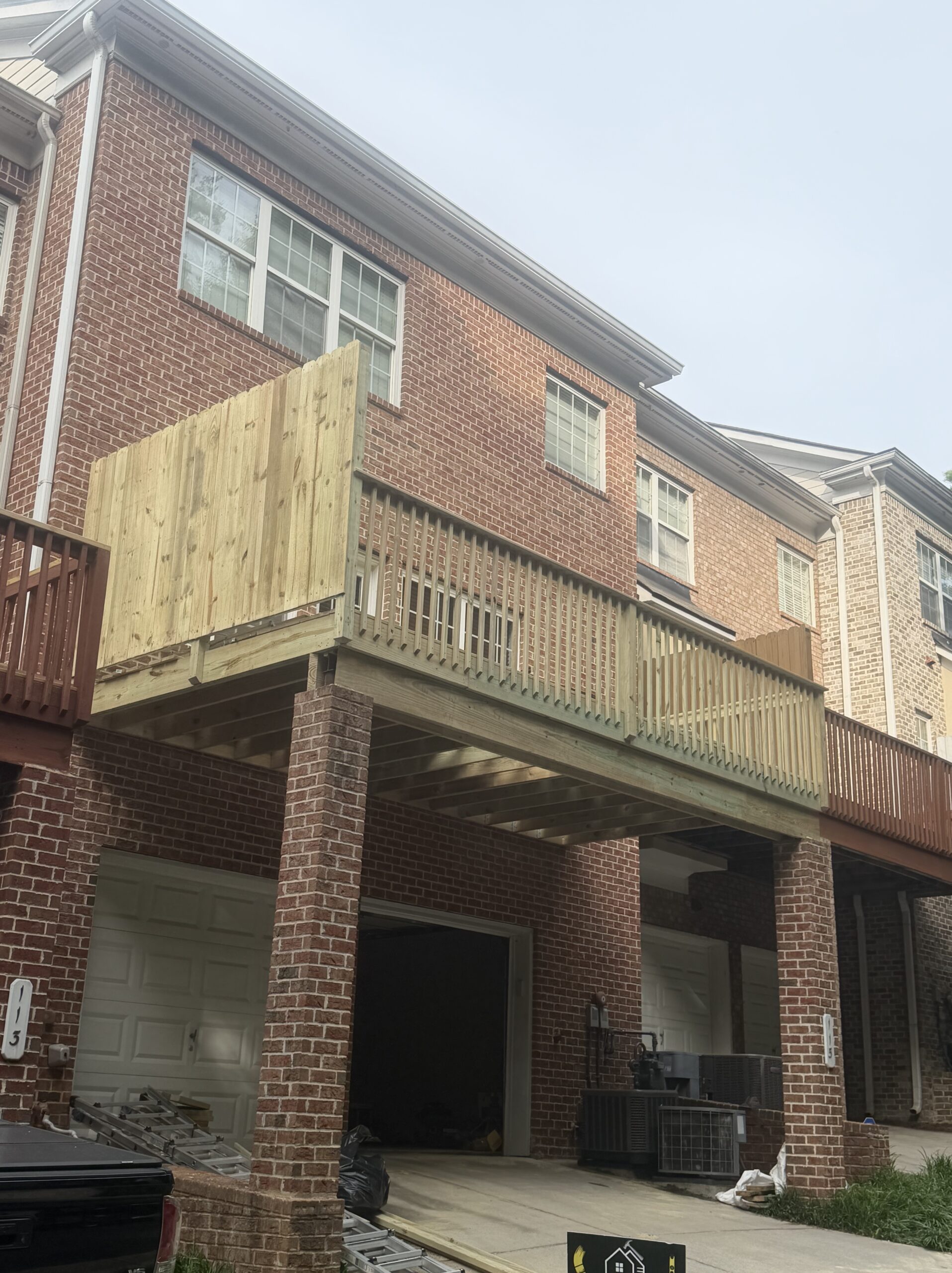 Recent deck rebuild by Interior Transformation Remodeling in Metro Atlanta with fresh pressure-treated boards and new railings